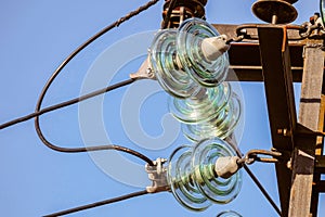 Electricity garlands close-up of insulators with electric wires