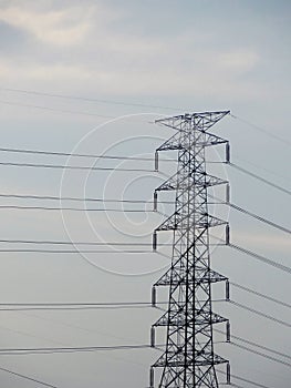 Electricity high voltage pole Pylon tower station against blue sky