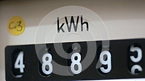 Electricity meter kWh symbol with shallow focus.