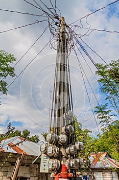 Electricity meter on a pole in Santa Juliana village, Luzon island, Philippine