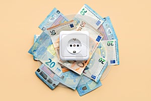Electricity outlet socket with euro bills