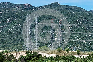 Electricity poles at mountain landscape