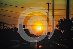 Electricity poles of street, sky during the sun rising, beautiful sunrise.