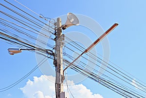 Electricity post in blue sky