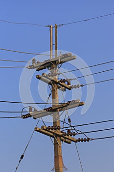 Electricity post in blue sky