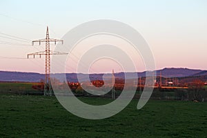 Electricity power lines in Baden Wuerttemberg at sunset, Germany