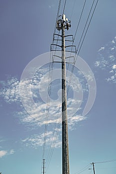 electricity provider. powering pylon utility. electricity power lines. pylon producing energy. voltage transmission on photo