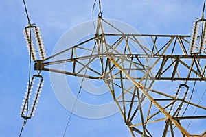 Electricity pylon against a sky background - power tower and transmission lines