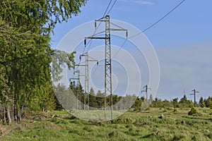 Electricity pylon in the  forest