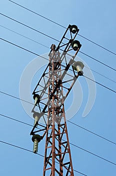 Electricity pylon with insulators and power lines