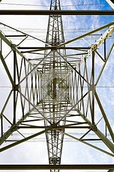 Electricity pylon metal structure bottom-up in architectural perspective