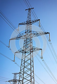 Electricity Pylon and Power Lines on Blue Sky