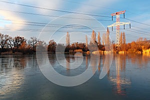 Electricity pylon with reflection