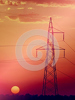 Electricity pylon at sunset