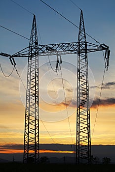 Electricity pylon on sunset