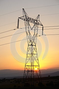 Electricity pylon in sunset