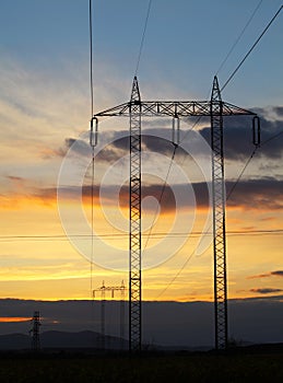 Electricity pylon sunset - power energy