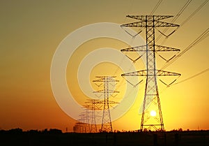 Electricity Pylons against Sunset