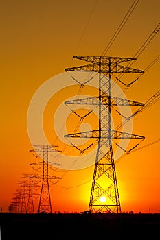 Electricity Pylons against Sunset