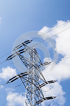 Electricity pylons with blue sky background