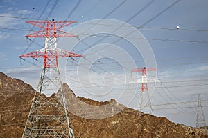 Electricity pylons in mountain landscape