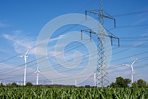 Electricity pylons, power lines and wind turbines
