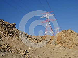 Electricity Pylons and sand - Ras al Khaimah, United Arab Emirates