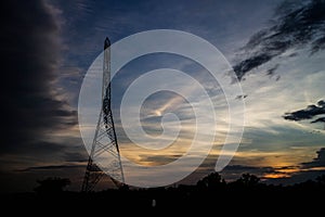 Electricity pylons at sunset