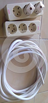 An electricity spare, a cable and electric plugs