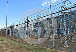 An electricity substation with danger sign