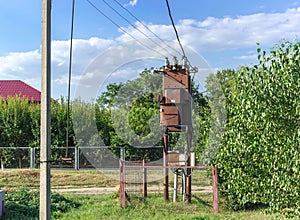 Electricity transformer substation mounted on pole, transformator, old style soviet