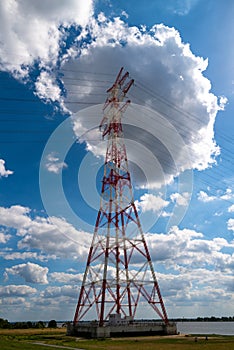 Electricity transmission. High power electricity poles. Transmission lines over sky. Transmission towers. Distribution of energy.