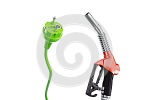 Electricity versus combustible fuel. Gas station nozzle and electrical plug. Technology, car costs, electric car vs gasoline car.