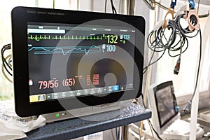 Electrocardiograph unit monitor in hospital emergency room photo