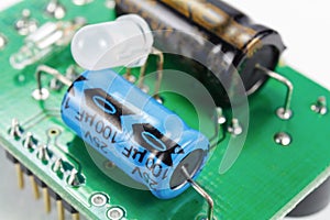 Electrolytic capacitors and LED diode on a printed circuit board