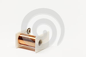 Electromagnet coil on white background