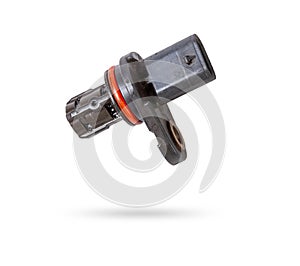 Electromagnetic crankshaft position sensor of a car engine in the hands of an auto mechanic. Spare parts catalog