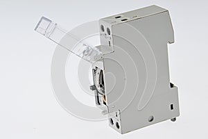 Electromechanical modular timer switch with opened transparent cover photo