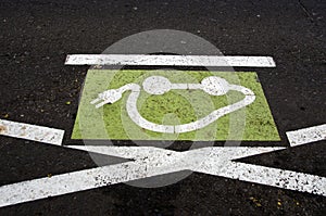 Electromobile transport road sign on city asphalt