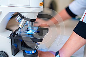 Electron microscope on the desktop in the medical laboratory photo