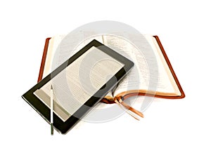 Electronic book reader laying on Bible