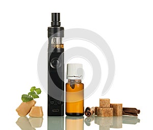 Electronic cigarette and liquid with the smell of cinnamon isolated on white