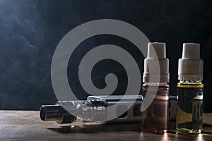 Electronic cigarette, vaping device with e liquid background.