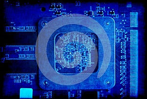 Electronic circuit board blue grunge background