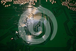 Electronic circuit board closeup. Electronic motherboard card. Circuitry and close-up on electronics. Background of