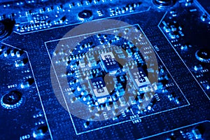 Electronic circuits in futuristic technology concept on mainboard