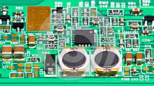 Electronic components close-up. Coils, resistors, capacitors, transistors and chip