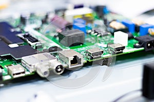 Electronic components. Focus in the Ethernet connector. Blur background. Electronic circuit board close up