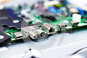 Electronic components. Focus in the Ethernet connector. Blur background. Electronic circuit board close up