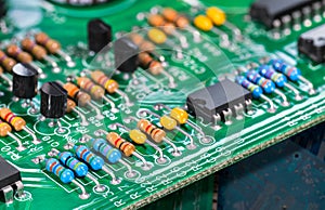 Electronic components. Integrated circuits, resistors, transistors and capacitors on PCB